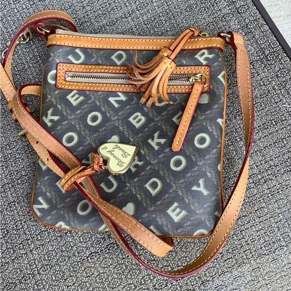 Dooney and Bourke crossbody 🧡🤍🧡 - Picture 1 of 12